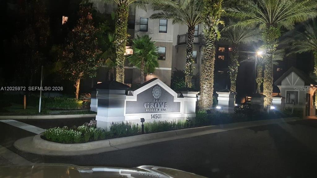 The exterior entrance sign for The Grove Resort and Spa is illuminated at night — 14501 GROVE RESORT AVENUE UNIT 3425, WINTER GARDEN, FL