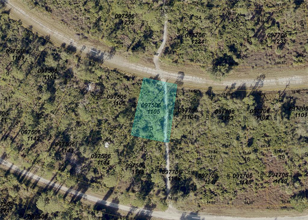 This is an aerial map showing a highlighted rectangular land parcel with surrounding lots — HERMOSA (LOT 5) CIRCLE, NORTH PORT, FL