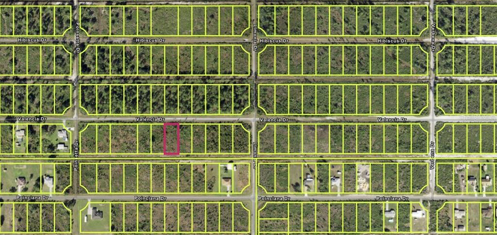 This is an aerial map showing a vacant lot highlighted in pink within a residential grid — 211 VALENCIA DRIVE, INDIAN LAKE ESTATES, FL