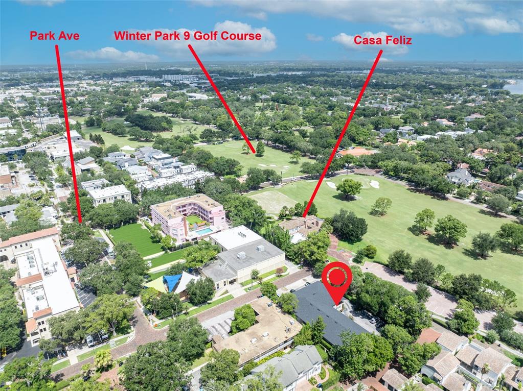 This aerial view shows a building marked with a red pin near a golf course — 644 N KNOWLES AVENUE UNIT 3, WINTER PARK, FL