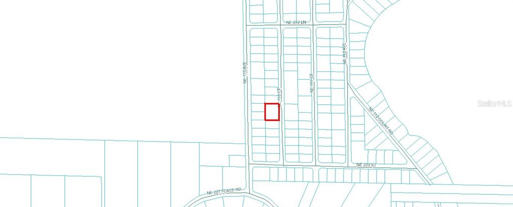 This is a plat map showing a highlighted rectangular lot within a residential subdivision — TBD NE 110 COURT, FORT MC COY, FL