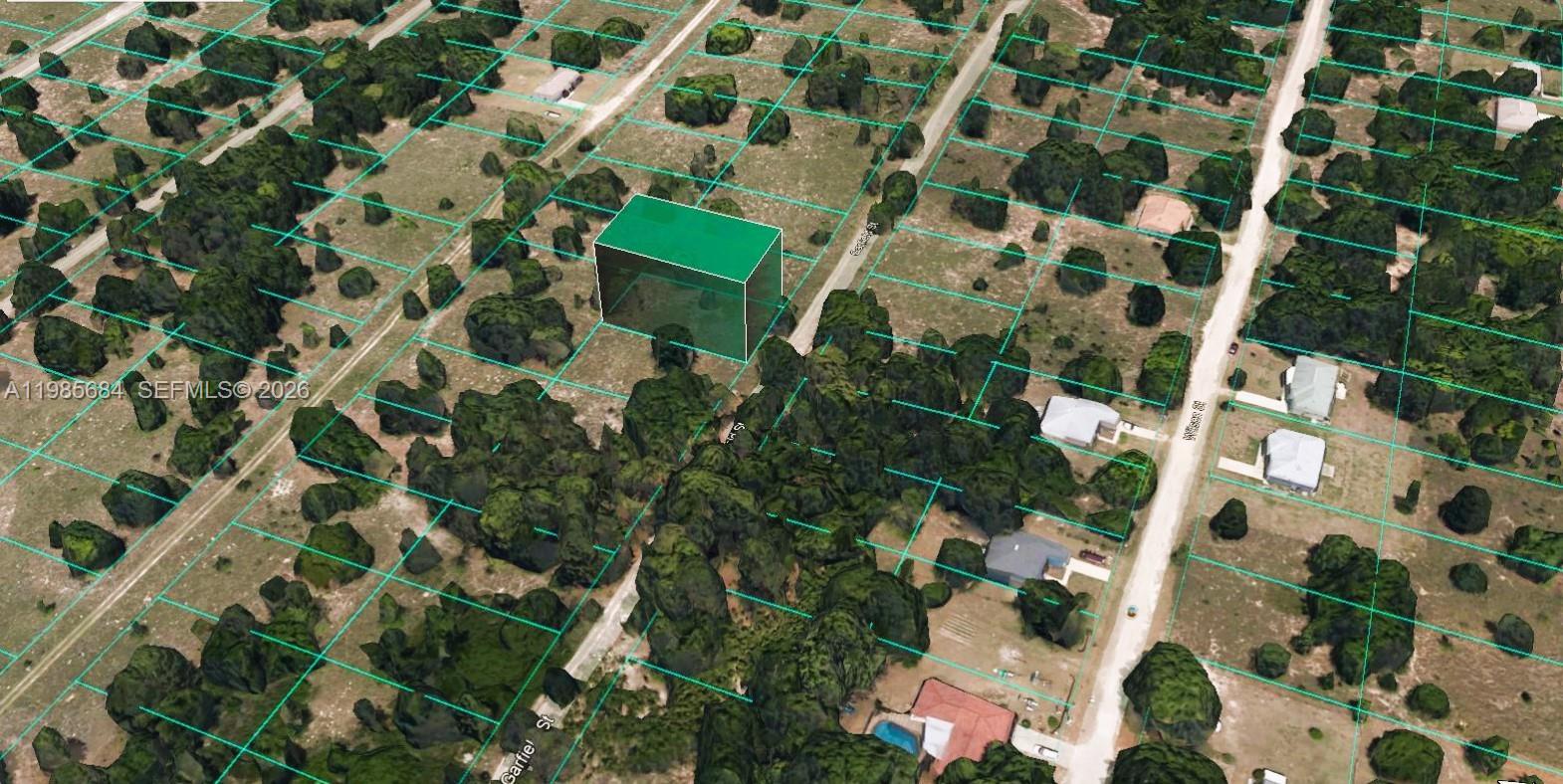 This aerial rendering shows a vacant, rectangular lot highlighted in green within a wooded area — 2314 Garfield St, Inverness FL 34453, INVERNESS, FL