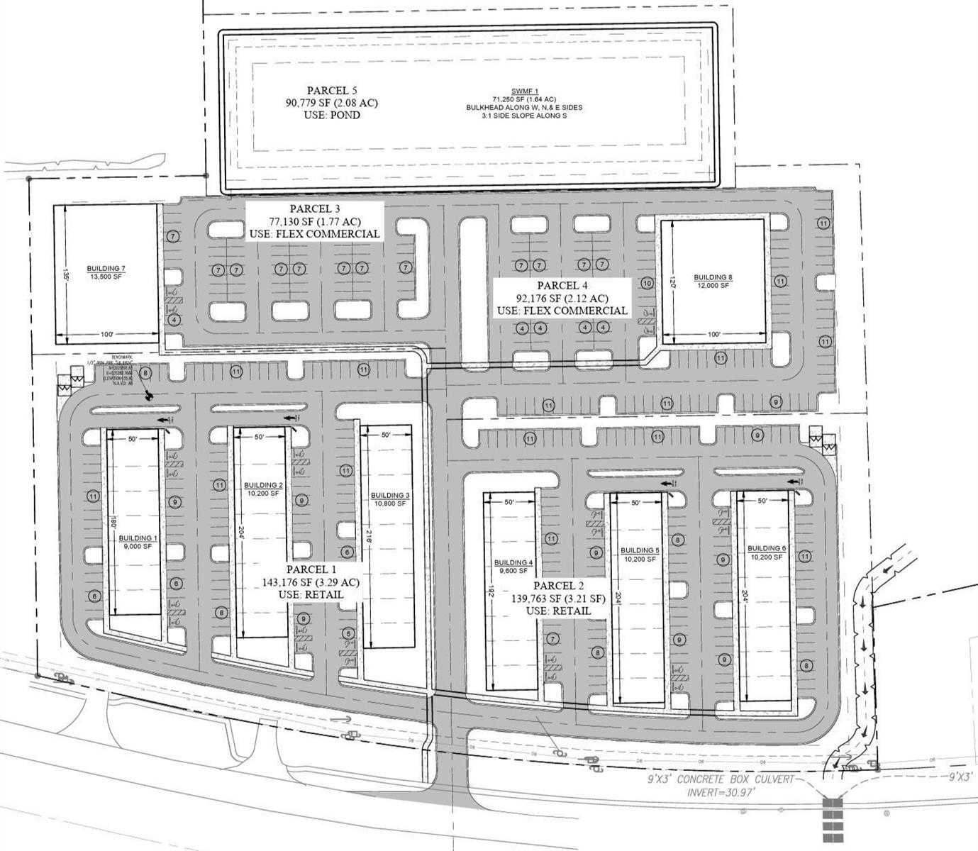 An aerial view shows a commercial property with two buildings, parking lots, and surrounding trees — 1900 State Road 16, FL 32084, FL