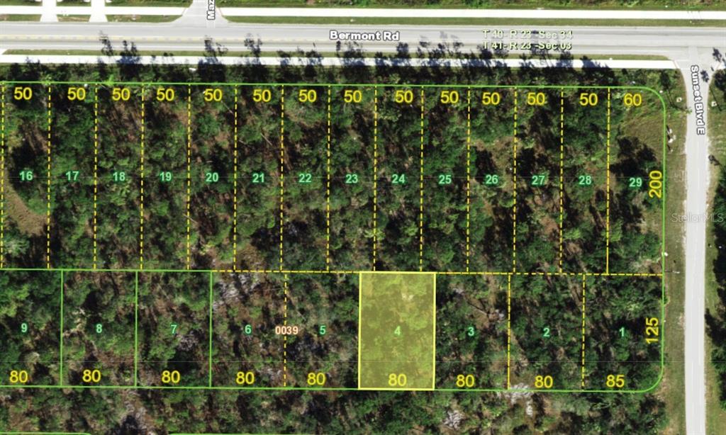 This is an aerial map showing a grid of subdivided land parcels with lot numbers — 5230 KNOLLWOOD DRIVE, PUNTA GORDA, FL