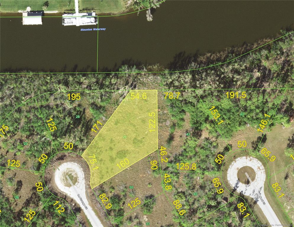 This is a map showing a highlighted residential lot bordering a waterway — 10116 LA GRANGE COURT, PORT CHARLOTTE, FL