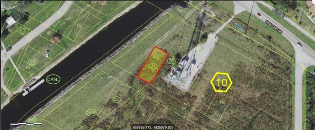 An aerial map shows a highlighted rectangular land parcel adjacent to a canal and road — NEPTUNE ROAD, KISSIMMEE, FL