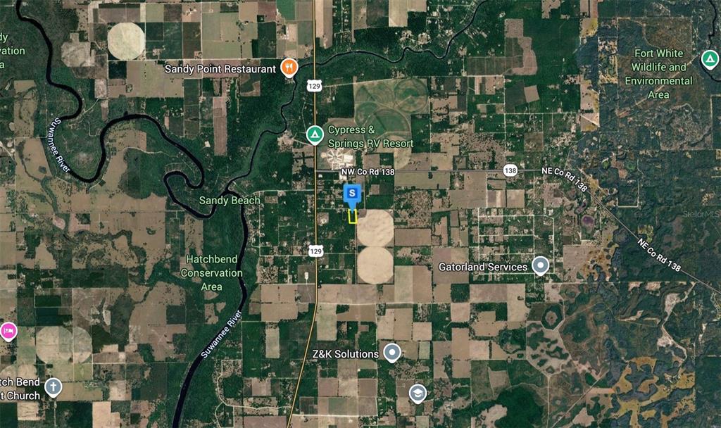 This is a satellite map showing the Suwannee River and surrounding rural landscape in Florida — 2539 NW 100 STREET, BRANFORD, FL