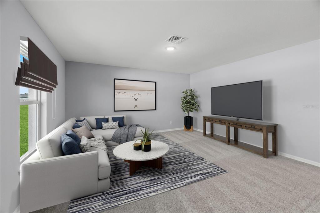 This digital rendering shows a living room with a sectional sofa, television, and area rug — 2295 W SWANSON DRIVE, CITRUS SPRINGS, FL