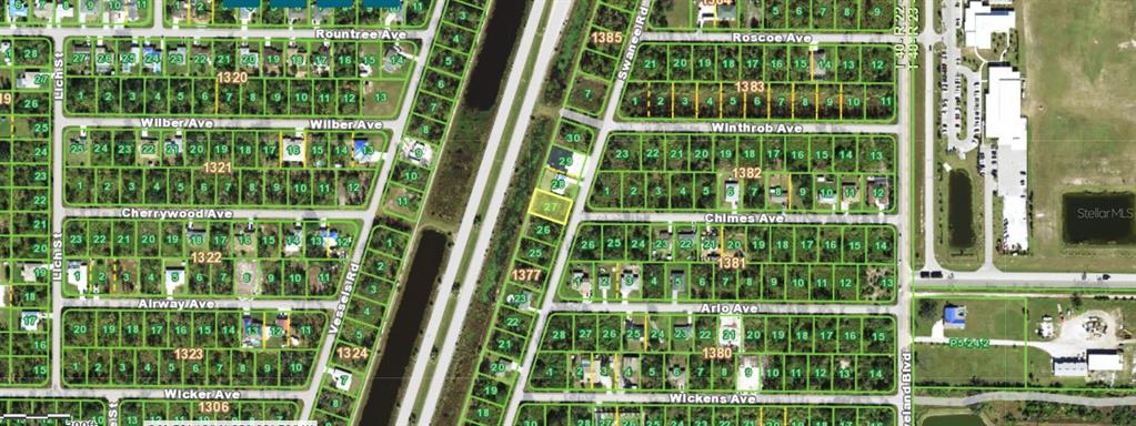 This is an aerial map showing residential lots and streets in a suburban neighborhood — 3145 SWANEE ROAD, PORT CHARLOTTE, FL
