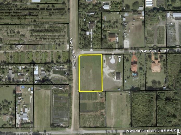 This is an aerial map view of a vacant rectangular lot bordered by two roads — 19690 SW 206th St, Miami FL 33187, MIAMI, FL