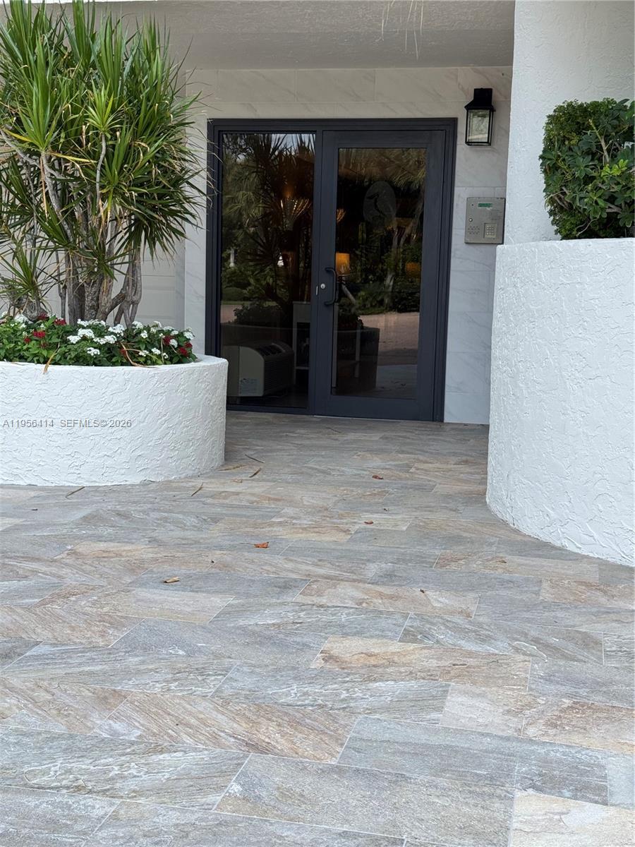 Coded Security Building Entry Doors, Updated facade — 290 Celestial Way # 2, Juno Beach FL 33408, JUNO BEACH, FL