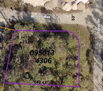 This is an aerial map of a vacant, wooded corner lot with property dimensions — LOT 6 TASCO DRIVE, NORTH PORT, FL