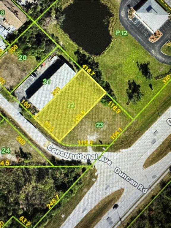 This is an aerial map showing a highlighted rectangular land parcel labeled 22 — 5400 CONSTITUTIONAL AVENUE, PUNTA GORDA, FL