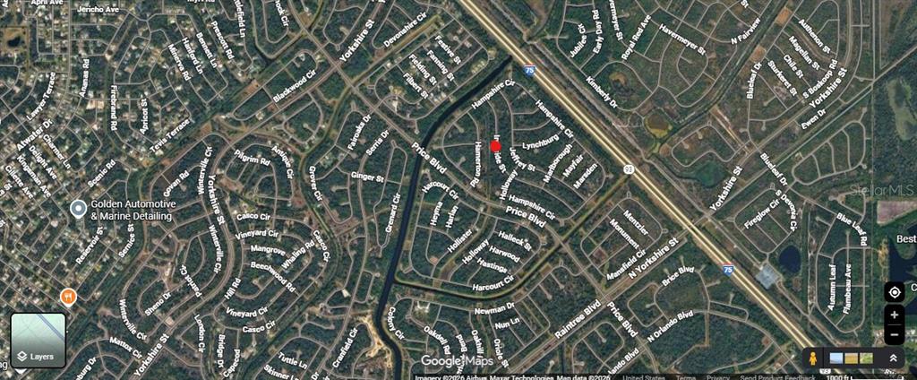 This is a satellite map view of a residential neighborhood with a red location marker — IRONSIDE STREET, NORTH PORT, FL