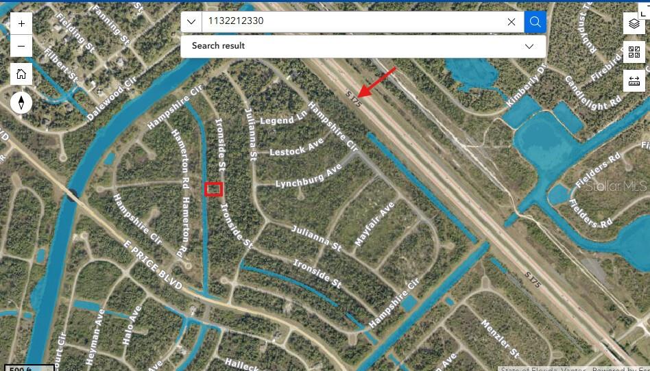 This is an aerial map showing a vacant lot highlighted in red within a residential neighborhood — IRONSIDE STREET, NORTH PORT, FL