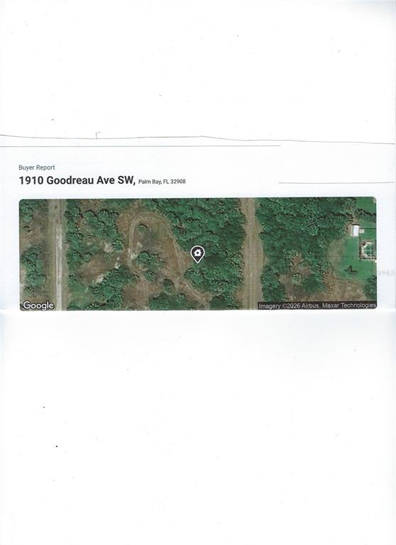 This is a satellite map view of a wooded, undeveloped residential lot — 1910 GOODREAU AVENUE SW, PALM BAY, FL