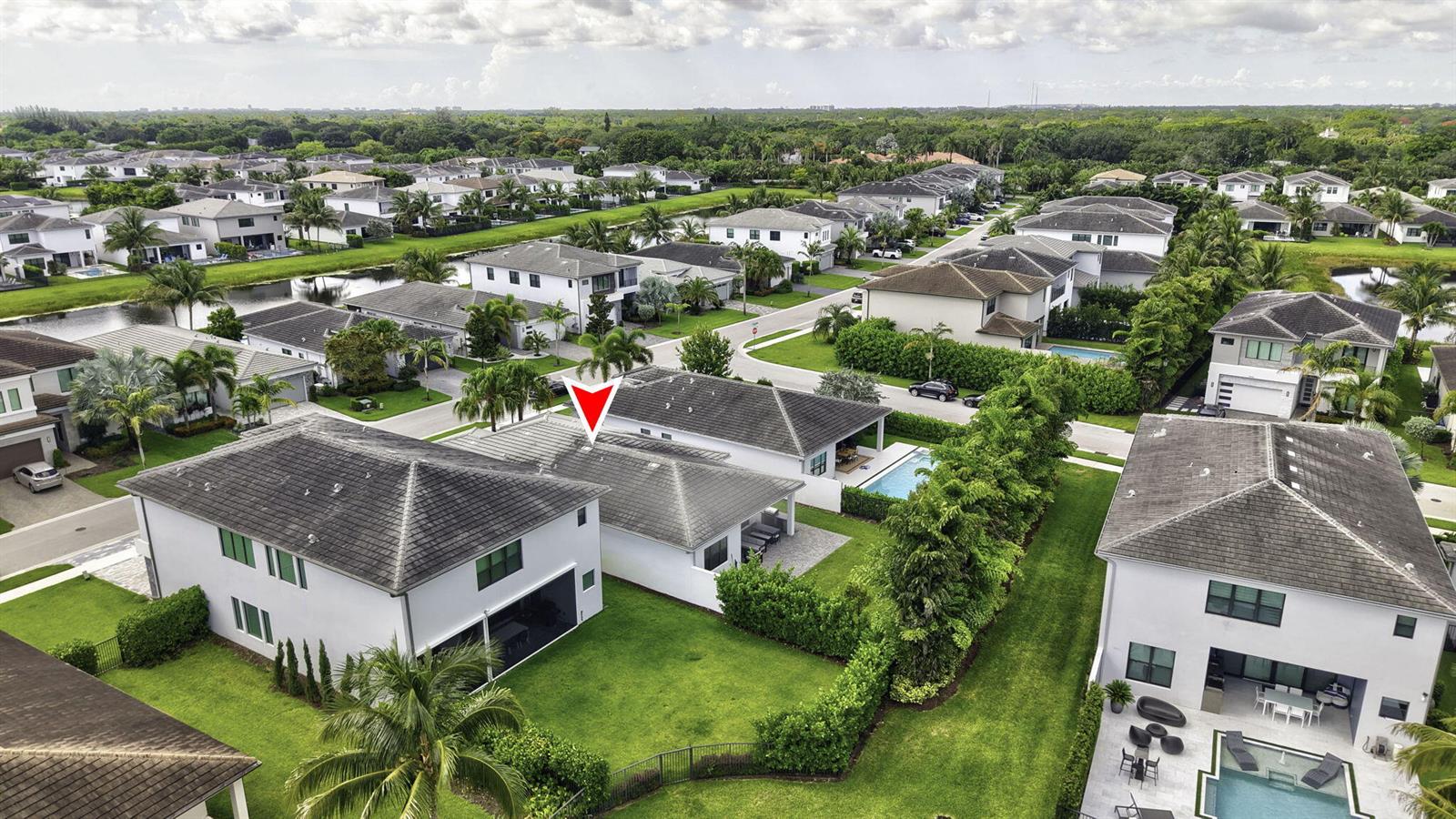 An aerial view shows a residential neighborhood with several two-story houses, green lawns, and pools — 8544 Apple Falls Lane, Boca Raton FL 33496, BOCA RATON, FL