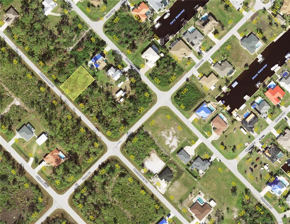 This is an aerial map showing a vacant residential lot highlighted in yellow — 3116 MONTGOMERY DRIVE, PORT CHARLOTTE, FL