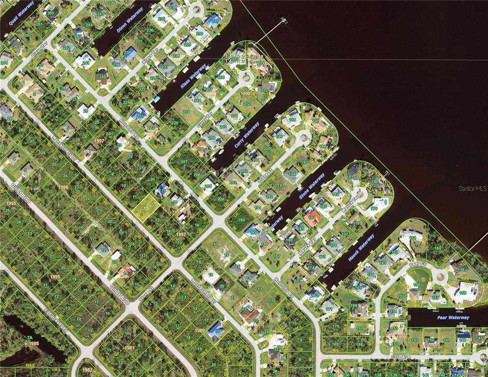 This is a map showing residential lots and waterways in a suburban neighborhood — 3116 MONTGOMERY DRIVE, PORT CHARLOTTE, FL
