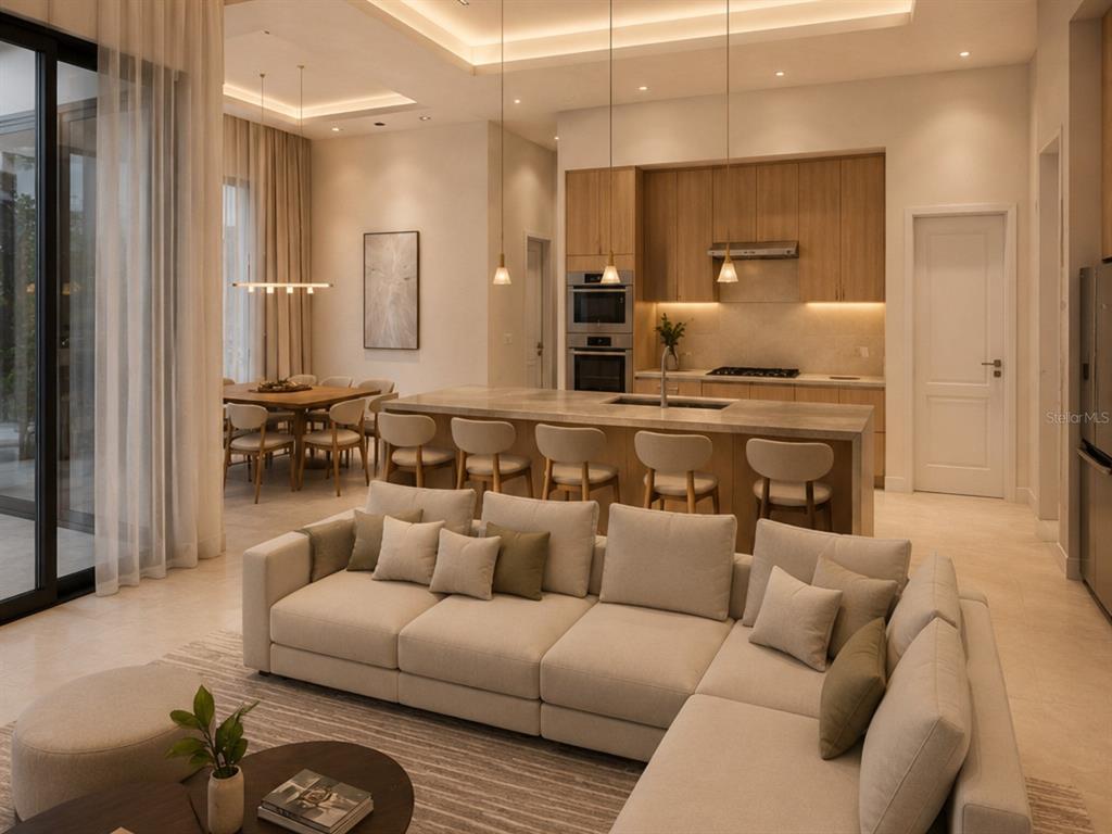 A modern open-concept living room and kitchen with light wood cabinetry and a large island — 15340 RED HEAD AVENUE, PORT CHARLOTTE, FL