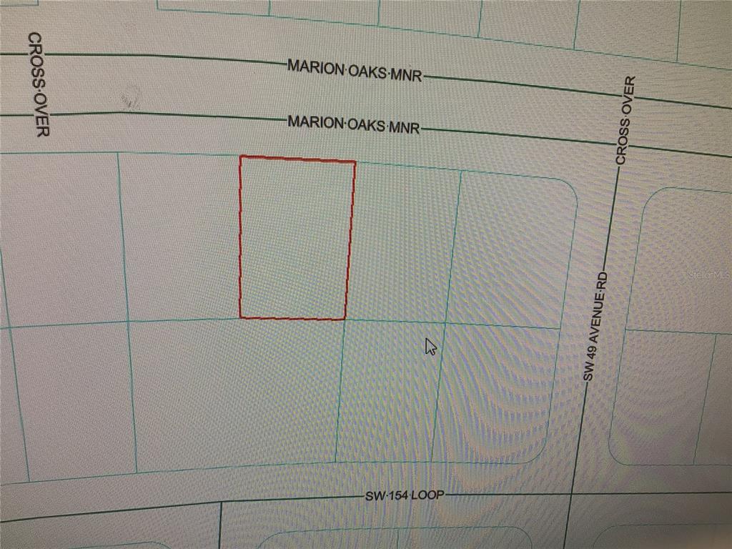 This is a map showing a rectangular property lot highlighted in red — 0 MARION OAKS MANOR, OCALA, FL