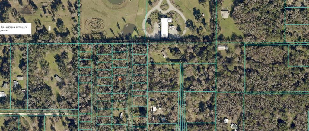 This is an aerial map view showing several wooded residential lots and property boundary lines — 00 SE 42ND COURT, BELLEVIEW, FL