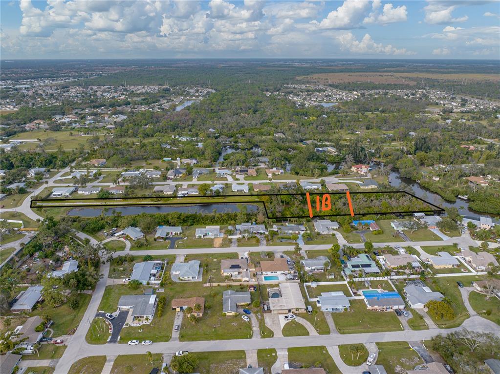 An aerial view shows a rectangular plot of land marked with the number 18 — STRATFORD 1B ROAD, ENGLEWOOD, FL
