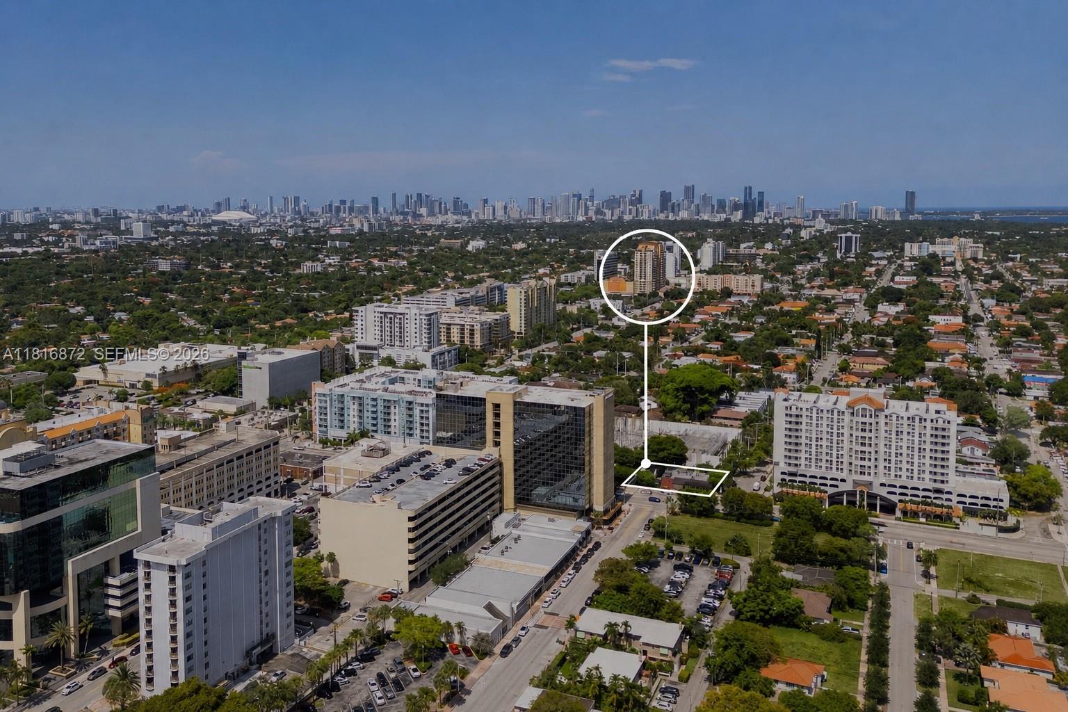 An aerial view shows a small building highlighted in a white box with a nearby high-rise circled — 2345 SW 37th Ave, Miami FL 33145, MIAMI, FL