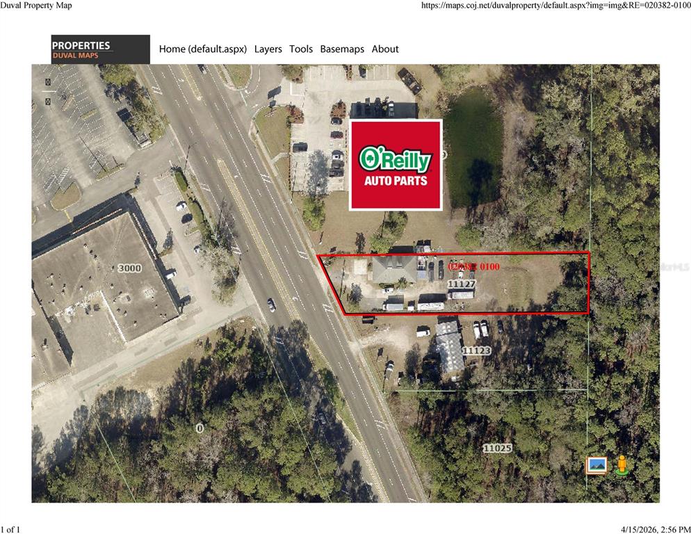 This is an aerial map showing a property outlined in red next to a road — 11127 LEM TURNER ROAD, JACKSONVILLE, FL