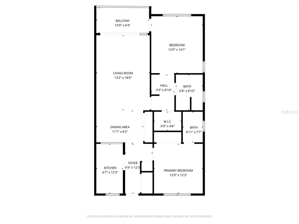This is a floor plan for a two-bedroom apartment with a balcony and two bathrooms — 11650 CAPRI CIRCLE S UNIT 204, TREASURE ISLAND, FL