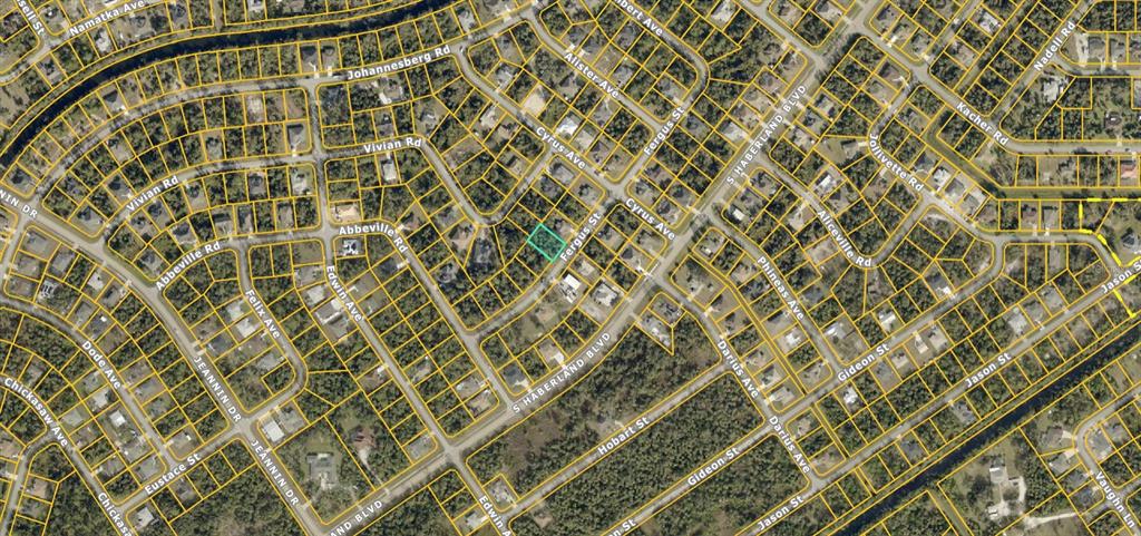 This is an aerial map view of a residential neighborhood with a highlighted property lot — LOT 20 BLK 1749 34TH ADD TO PORT CHARLOTTE, NORTH PORT, FL
