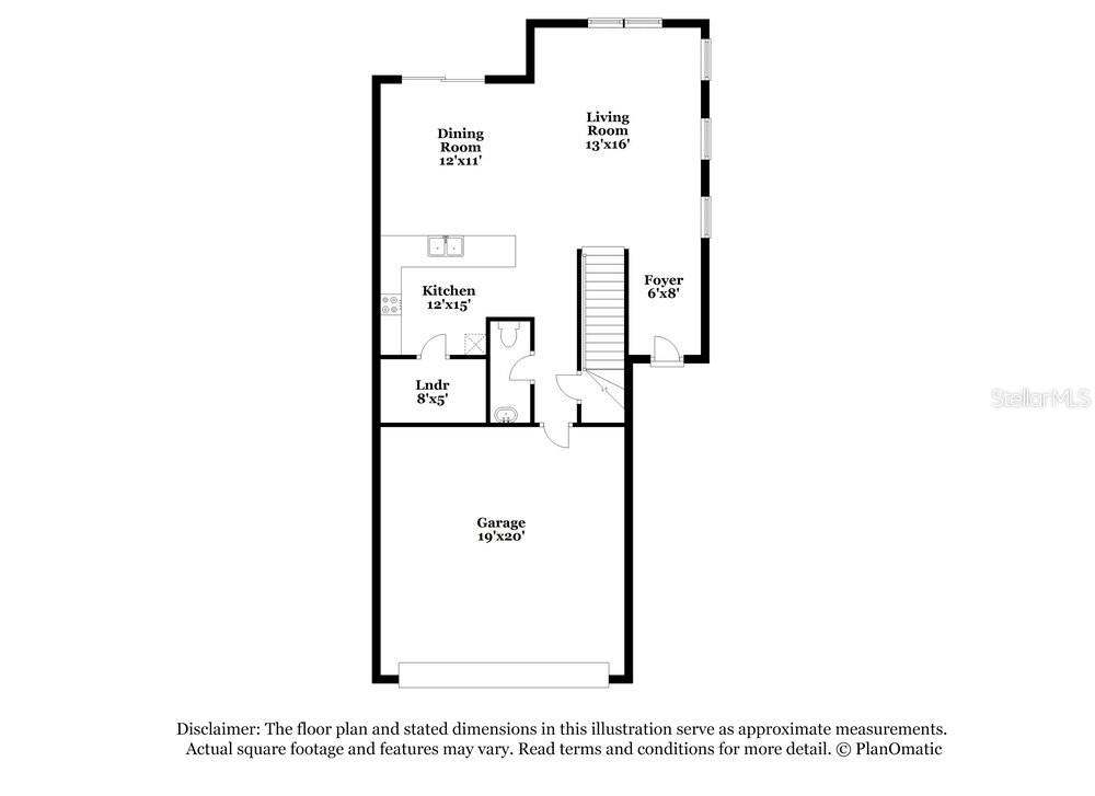 This is a floor plan of a home's main level featuring a garage and kitchen — 17512 RADIANT SHINE WAY, LUTZ, FL