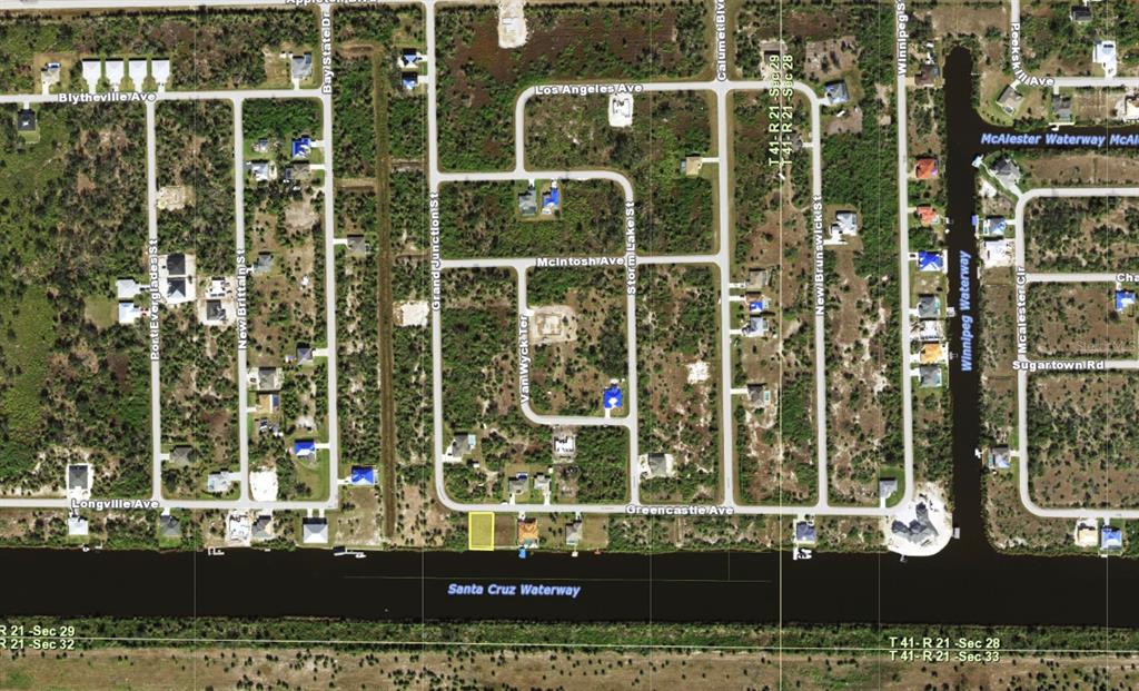 This is an aerial map view of a residential lot along the Santa Cruz Waterway — 13421 GREENCASTLE AVENUE, PORT CHARLOTTE, FL