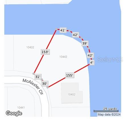 This map shows the property boundaries and dimensions for a waterfront residential lot — 10442 MCALESTER CIRCLE, PORT CHARLOTTE, FL