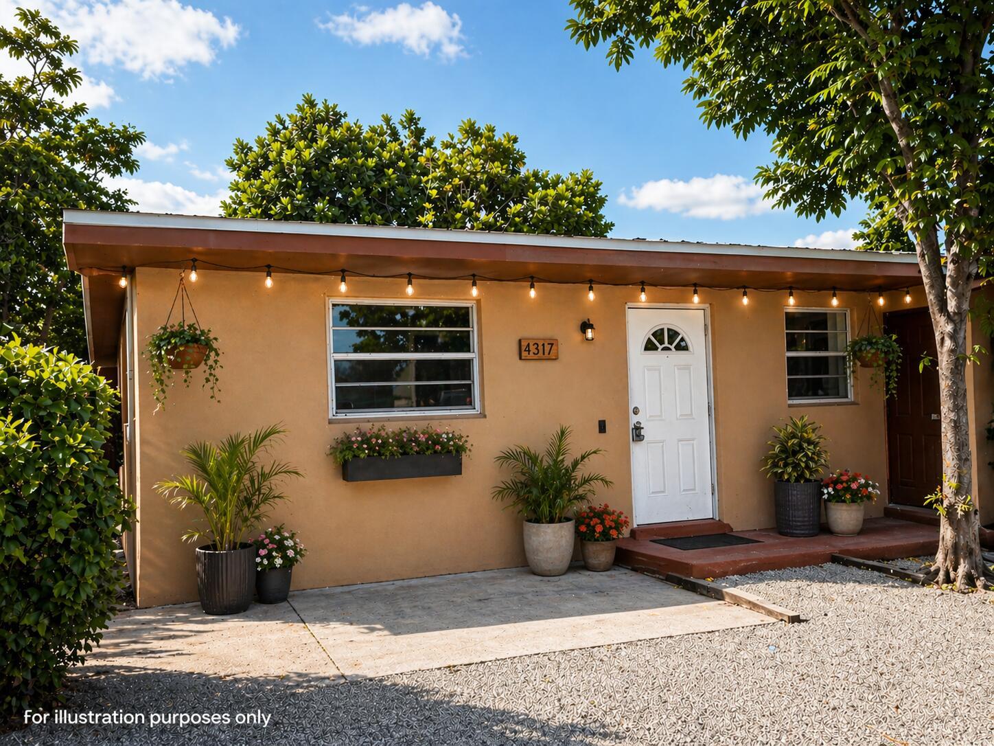 The exterior of a tan, single-story house features a white door, string lights, and potted plants — 4317 Cocoanut Road, West Palm Beach FL 33406, WEST PALM BEACH, FL