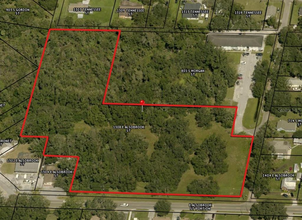 An aerial map shows a large, irregularly shaped plot of land outlined in red — 1308 E ALSOBROOK STREET, PLANT CITY, FL