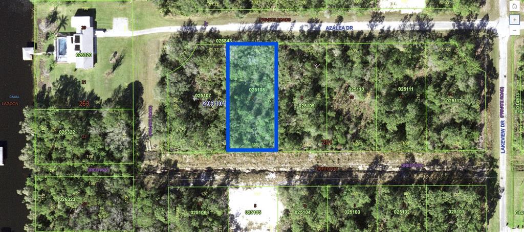 This is a map showing a highlighted rectangular plot of land surrounded by trees — 1009 AZALEA DRIVE, INDIAN LAKE ESTATES, FL
