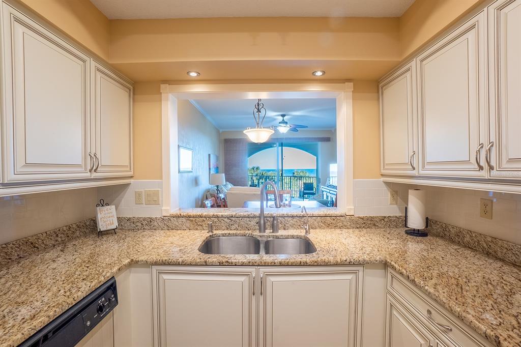A view of the ocean at night with a full moon reflecting on the water — 104 SURFVIEW DRIVE UNIT 2204, PALM COAST, FL