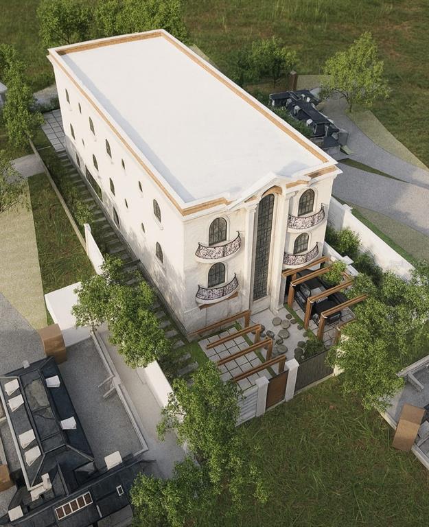 An aerial rendering shows a three-story white building with arched windows and small balconies — AVERY AVENUE, CRYSTAL BEACH, FL