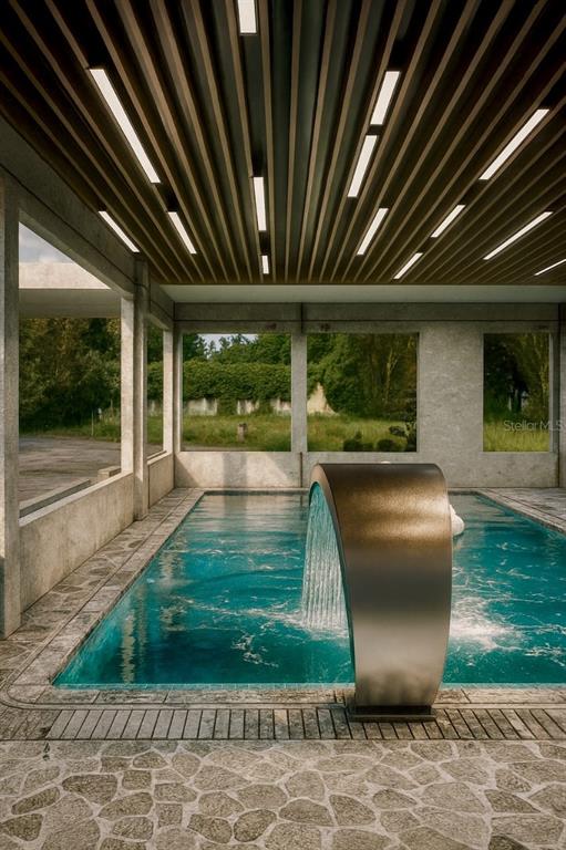 This is a rendering of an indoor pool room with a waterfall feature and slatted ceiling — AVERY AVENUE, CRYSTAL BEACH, FL
