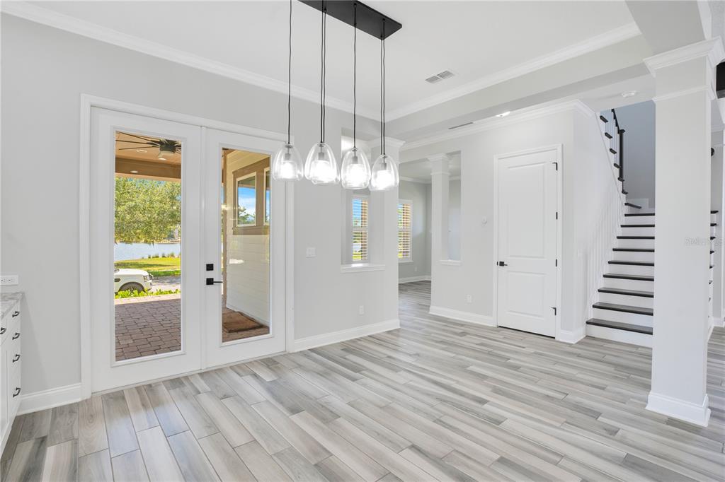 An aerial view shows a house with a dark roof, a swimming pool, and landscaping — 13101 GABOR AVENUE, ORLANDO, FL