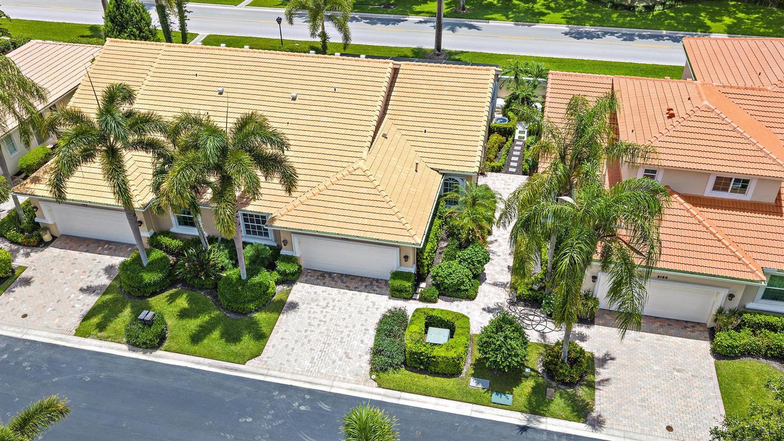 An aerial view shows two adjacent suburban houses with tiled roofs and paved driveways — 8164 Sandpiper Way, West Palm Beach FL 33412, WEST PALM BEACH, FL