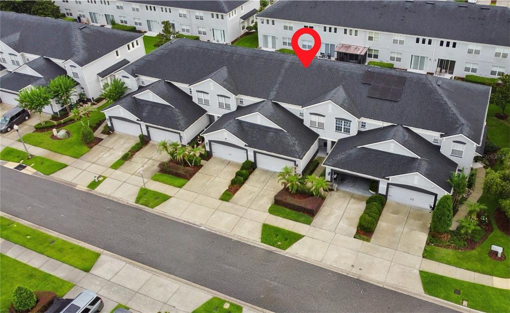 An aerial view shows a row of townhouses with a red pin marking one unit — 1641 SHALLCROSS AVENUE, ORLANDO, FL