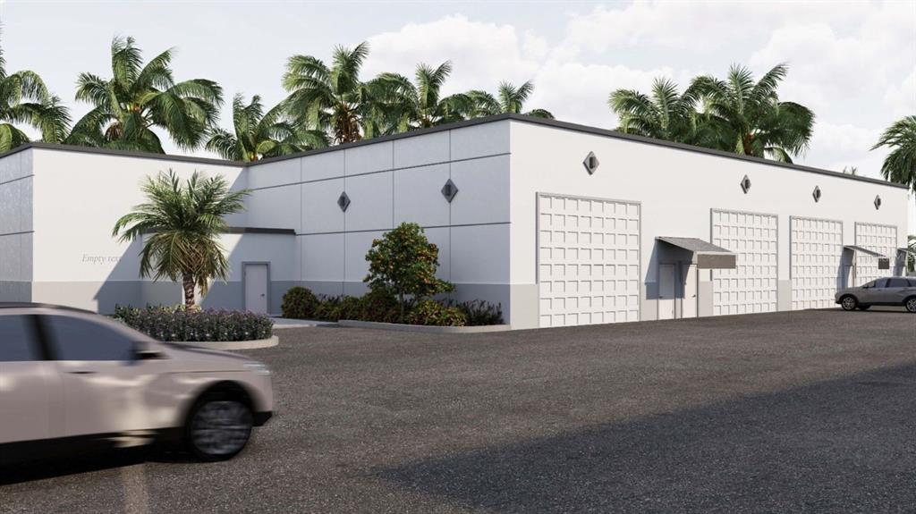 This is a digital rendering of a modern commercial warehouse building with multiple roll-up doors — 5233 TAYLOR ROAD UNIT B1, PUNTA GORDA, FL