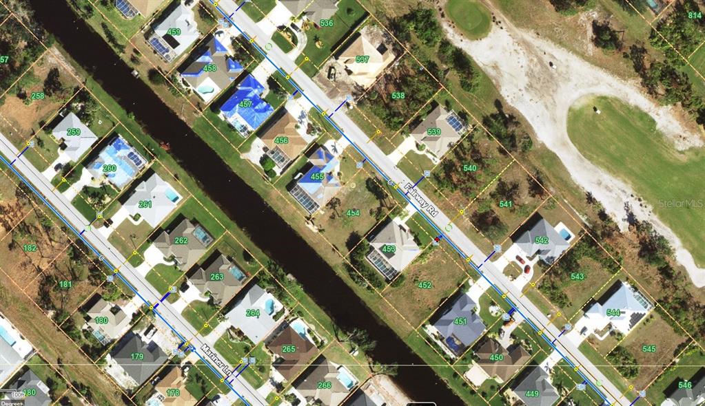 This is an aerial map showing residential properties along a canal and street — 85 FAIRWAY ROAD, ROTONDA WEST, FL