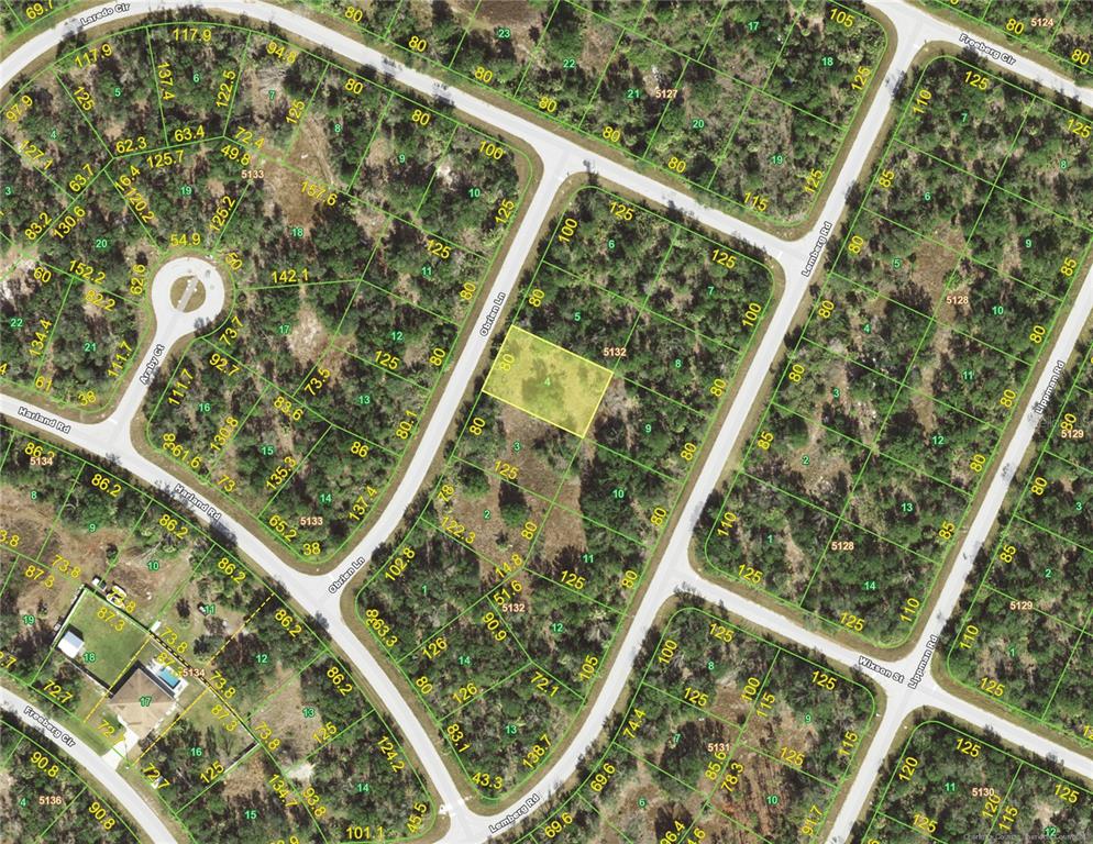 This is a satellite map showing a residential neighborhood with highlighted vacant land parcels — 7108 OBRIEN LANE, PORT CHARLOTTE, FL