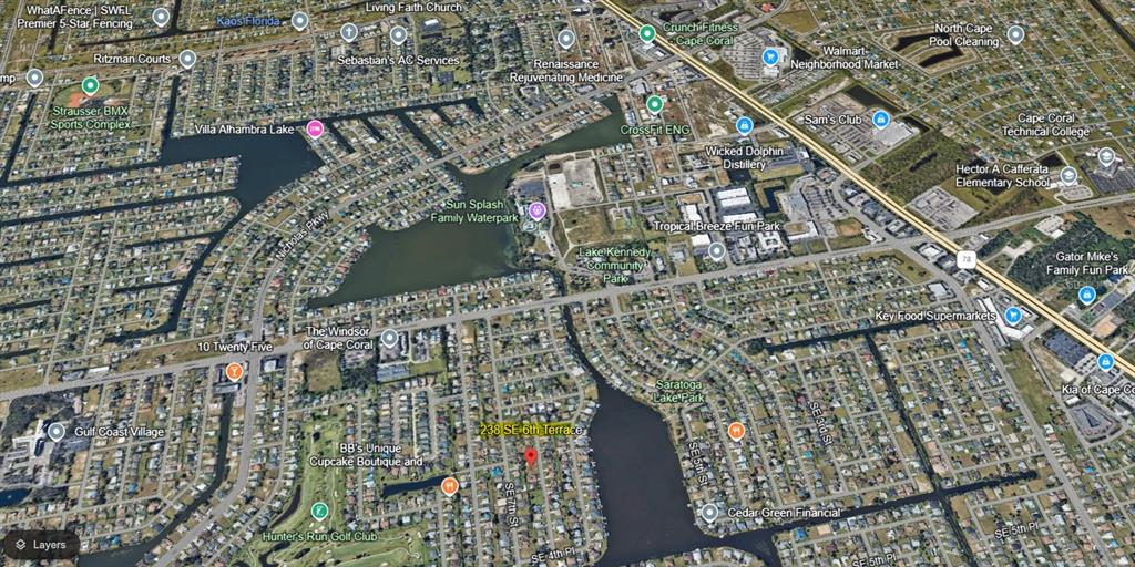 This is an aerial map view of a residential neighborhood in Cape Coral, Florida — 238 SE 6TH TERRACE, CAPE CORAL, FL