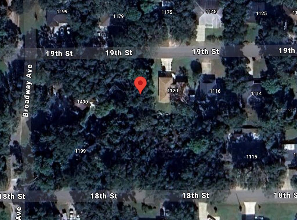 This is an aerial map view showing a residential lot marked with a red pin — 1160 19TH STREET, ORANGE CITY, FL