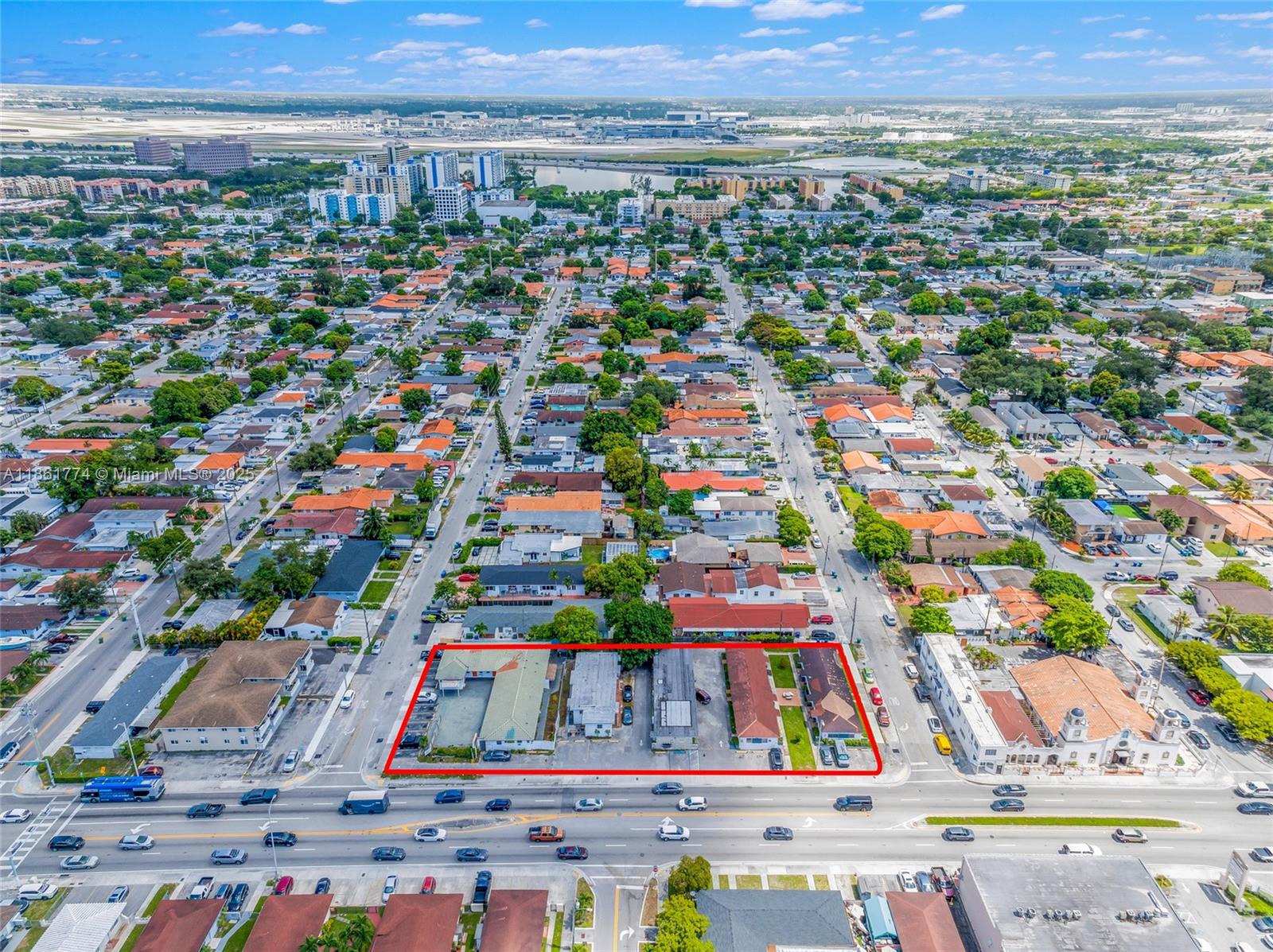 An aerial view shows a rectangular property lot outlined in red along a busy street — 4831 W Flagler St, Miami FL 33134, MIAMI, FL