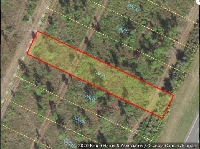 An aerial map shows a rectangular parcel of land outlined in red among adjacent lots — S KENANSVILLE ROAD, OKEECHOBEE, FL